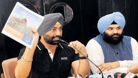 AAP leader Sukhpoal Singh Kahira along Himmat Singh Shergill during a press conference on Thursday. Tribune photo: Manoj Mahajan